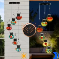 Clearance OBOSOE Solar Hummingbird Feeder med vindklokke – 6 lækagesikre glasdøre, matteret design og flerfarvet natlys Vinddekoration