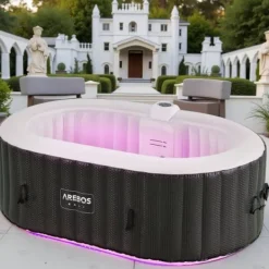 Spa & Udendørsbad^Oppustelig spa Florence – 2400W | 154 x 154 x 65 cm | 4-personers jacuzzi | 100 massagedyser | Op til 40°C opvarmning | Oppustelig spa indendørs og ud | CDON