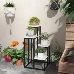 Online Rootz blomsterhylde - 4 etagers plantehylde - blomsterstativ - indendørs og udendørs - metalramme - grantræ - sort + hvid - 34L x 34W x 70H cm Plantestativer